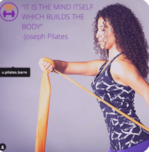 a purple background with a woman doing pilates. the text reads ¨it is the mind itself which blends the body¨ quote from joseph pilates