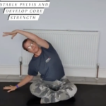 Image of Alex, Online Yoga Trainer, teaching seated side bends for yoga core flexibility