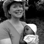 Image of Karen holding a small child | 1 month nutritional cleanse testimonials
